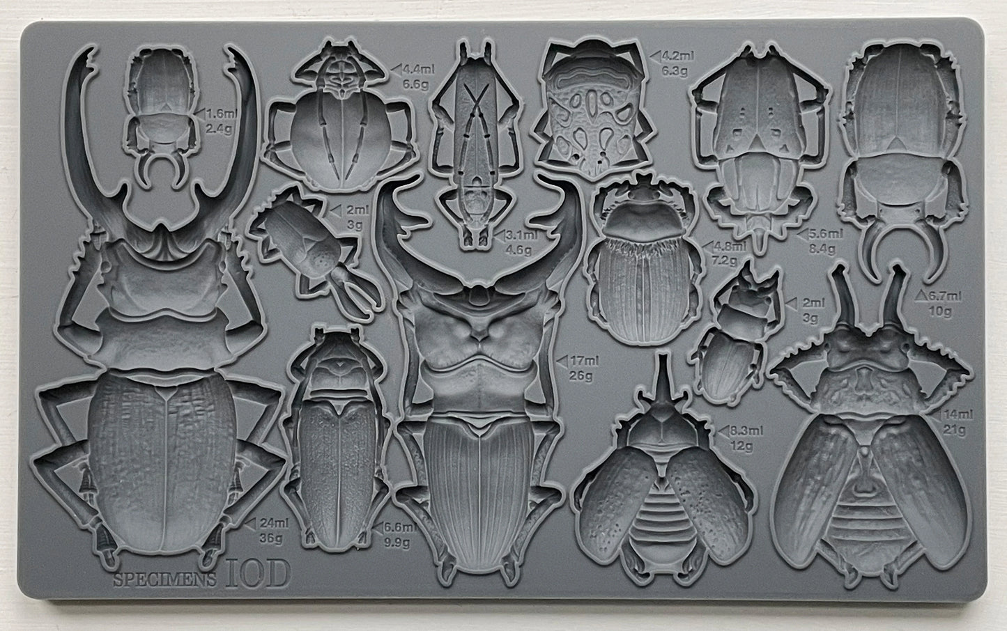 Bug, beetles,IOD Moulds are the most beautifully designed, deeply detailed moulds on the market. They are made from food safe materials (do not use the same set for food and crafts), and can be used to transform and create baked goods, furniture, soaps, jewelry, and more! You can use IOD moulds with a bazillion different mediums ( yes, we counted.), transforming your projects into masterpieces with ease!