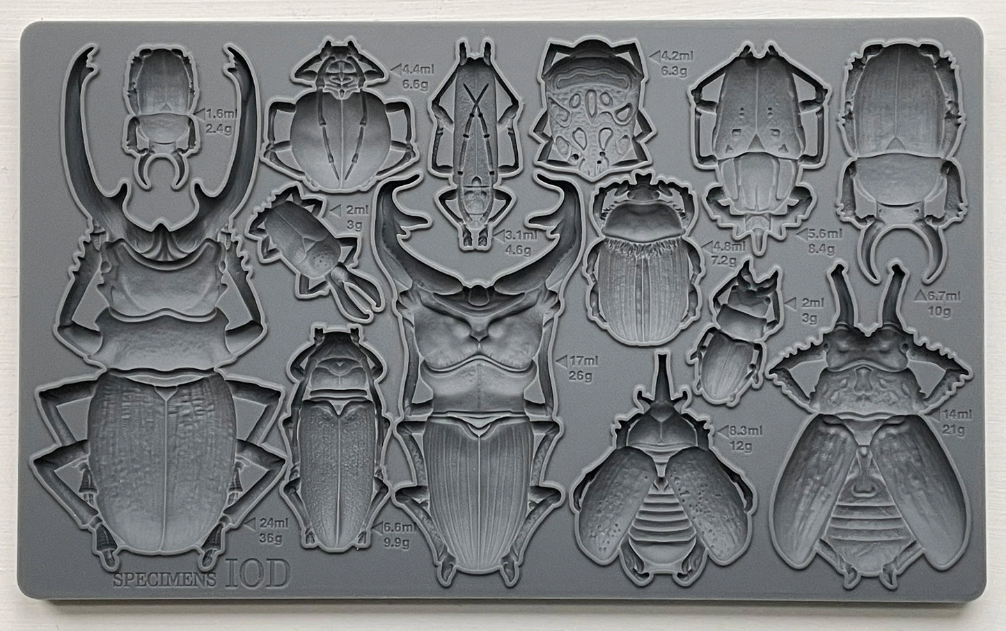 Bug, beetles,IOD Moulds are the most beautifully designed, deeply detailed moulds on the market. They are made from food safe materials (do not use the same set for food and crafts), and can be used to transform and create baked goods, furniture, soaps, jewelry, and more!  You can use IOD moulds with a bazillion different mediums ( yes, we counted.), transforming your projects into masterpieces with ease!